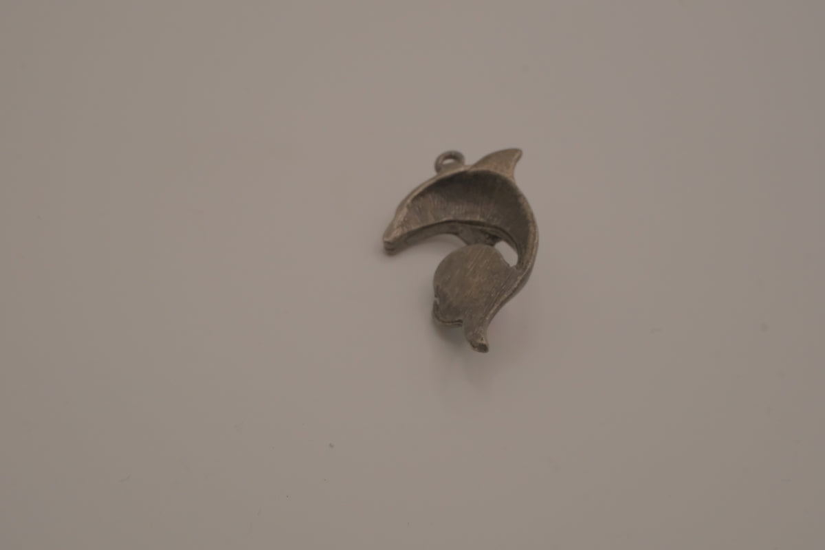 Vintage pewter dolphin pendant with an iridescent glass orb