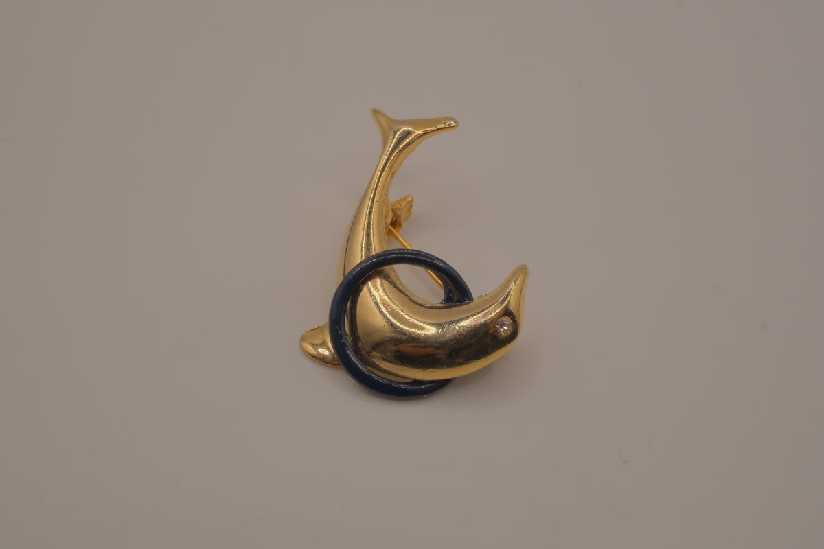 Vintage dolphin in hoop brooch pin