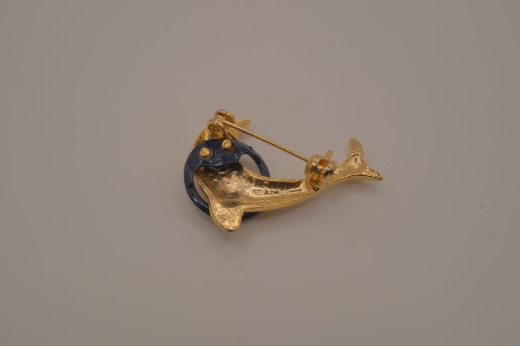 Vintage dolphin in hoop brooch pin