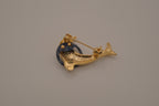 Vintage dolphin in hoop brooch pin