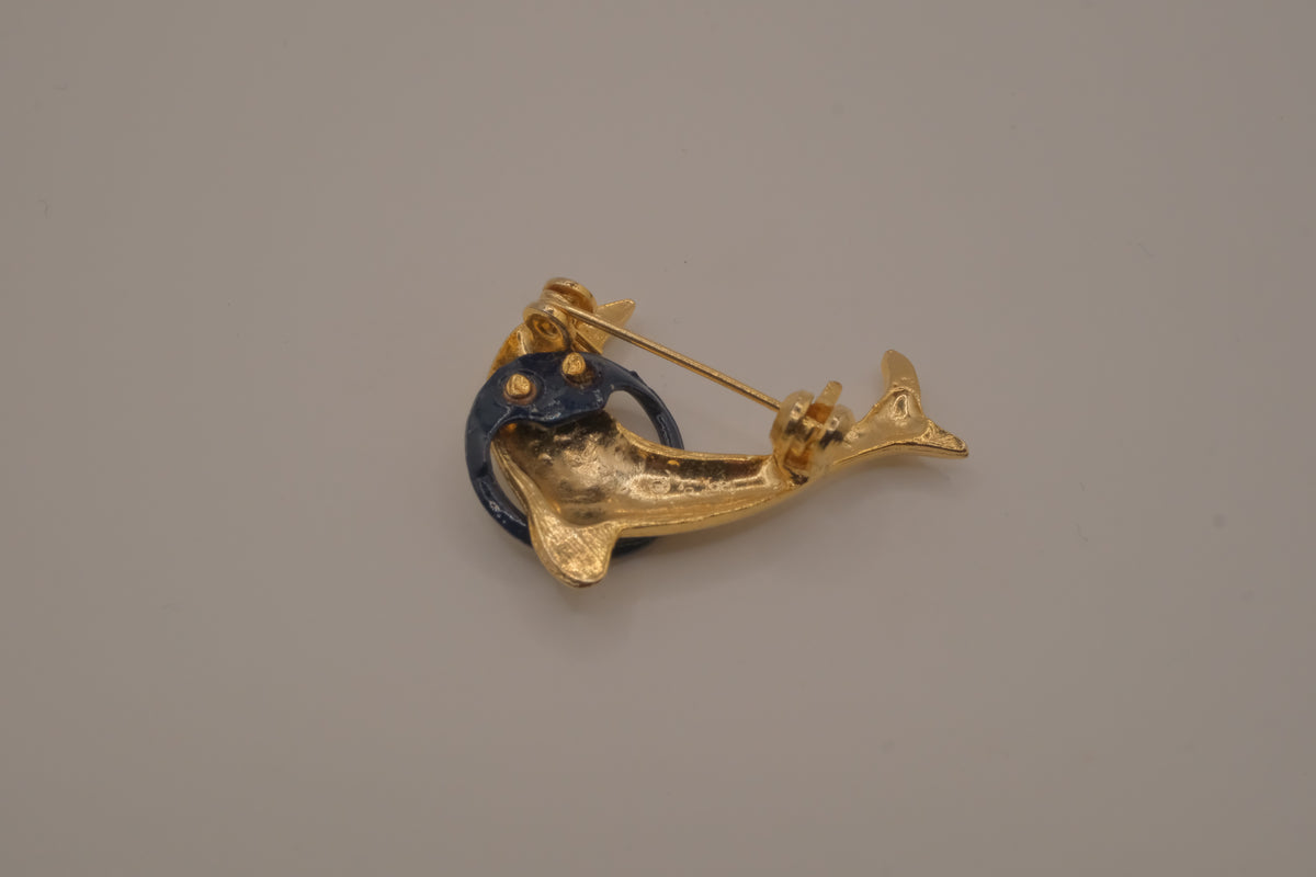 Vintage dolphin in hoop brooch pin