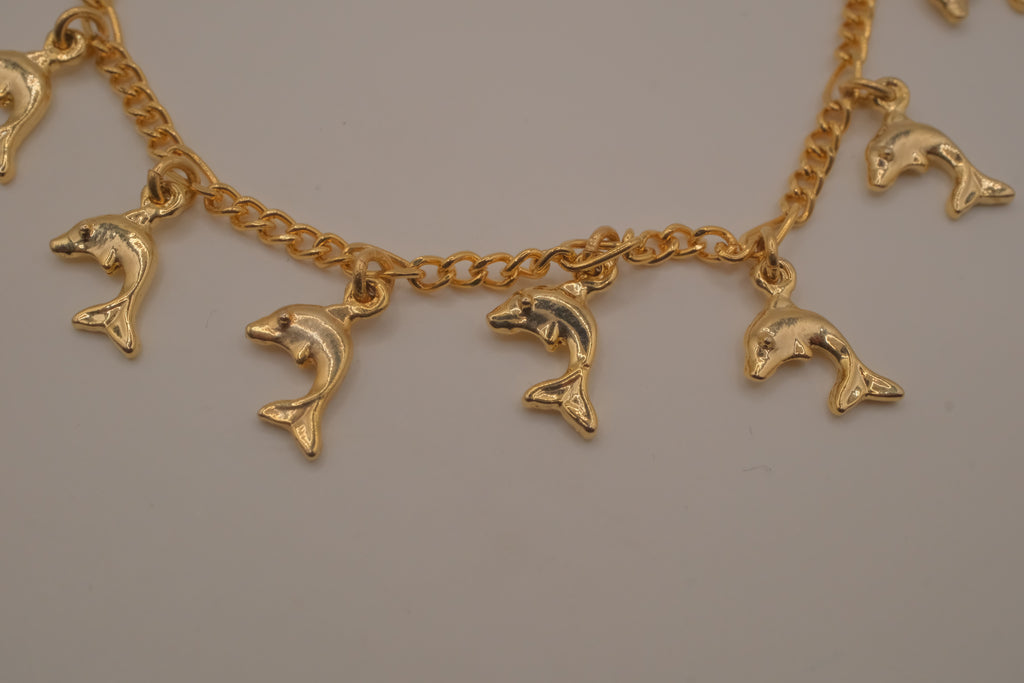 Gold tone Dolphin charm bracelet