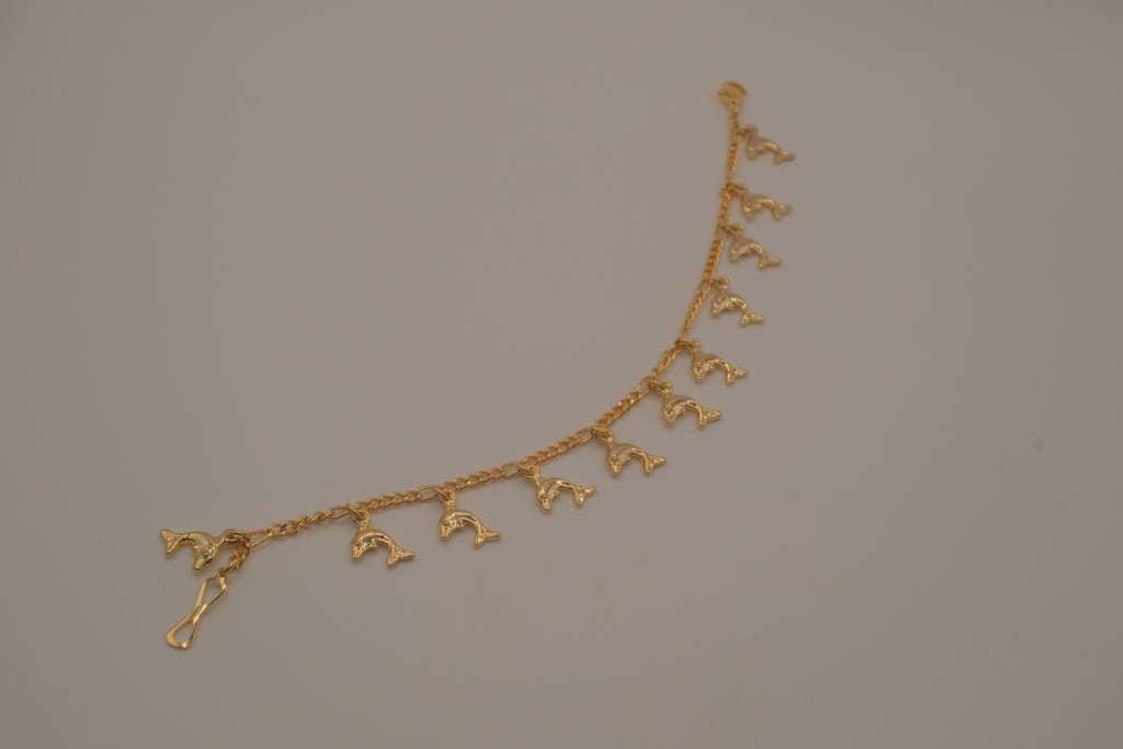 Gold tone Dolphin charm bracelet