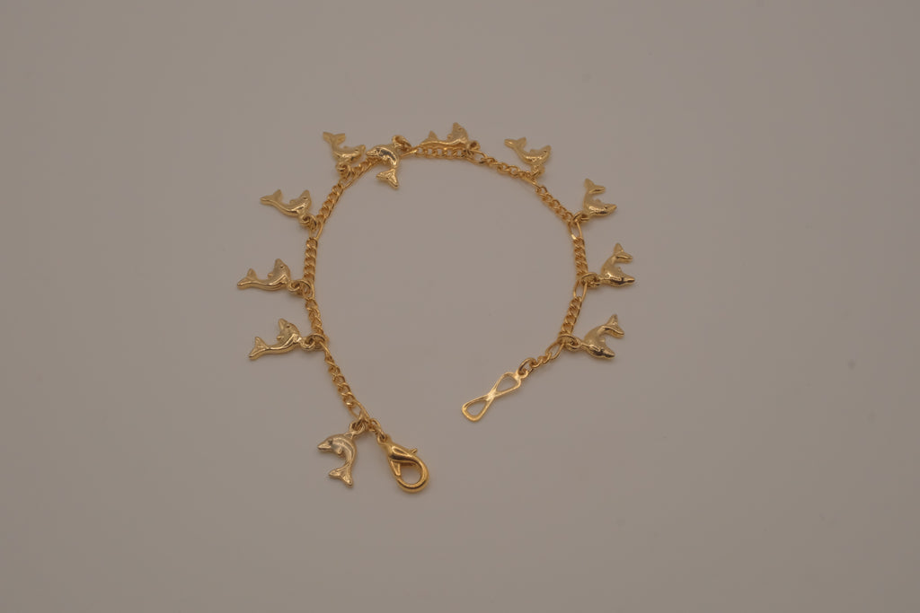 Gold tone Dolphin charm bracelet