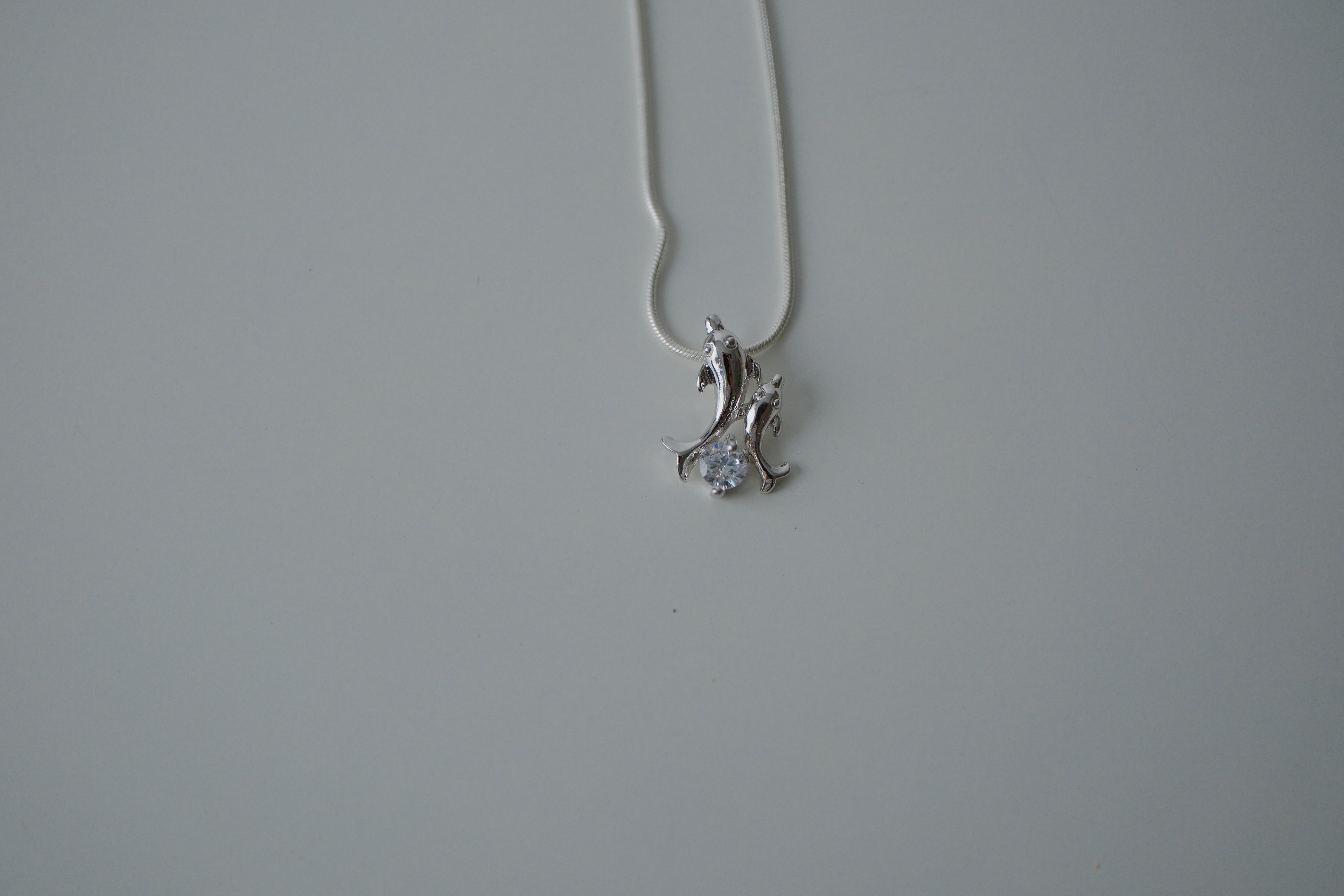 Double Dolphin Sterling Silver Necklace