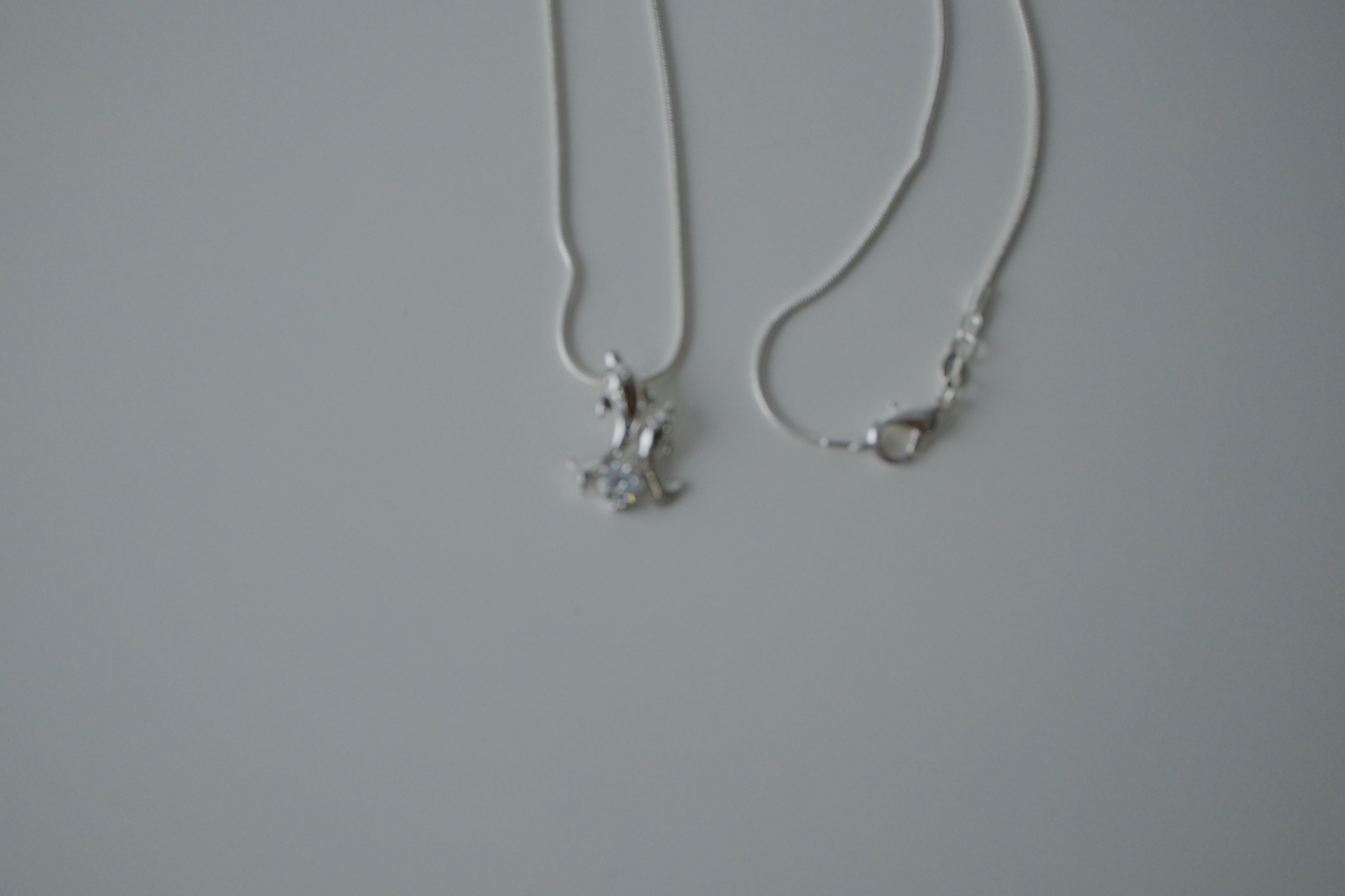 Double Dolphin Sterling Silver Necklace