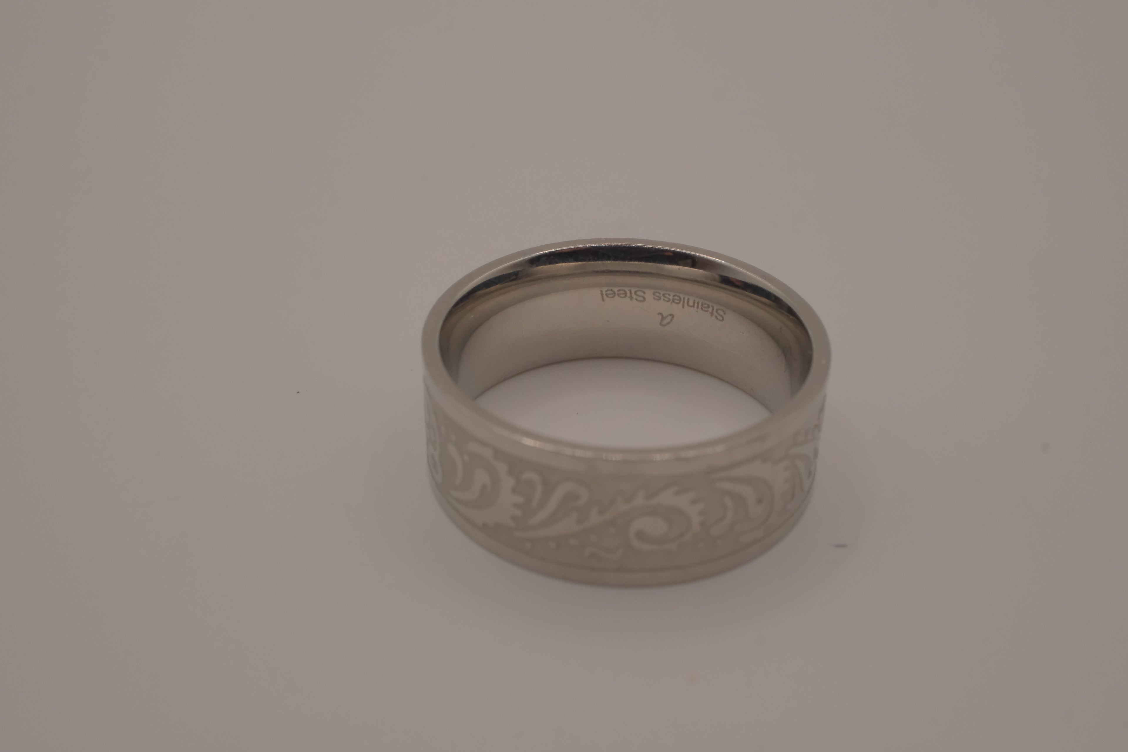 Coin crafted floral scroll pattern ring