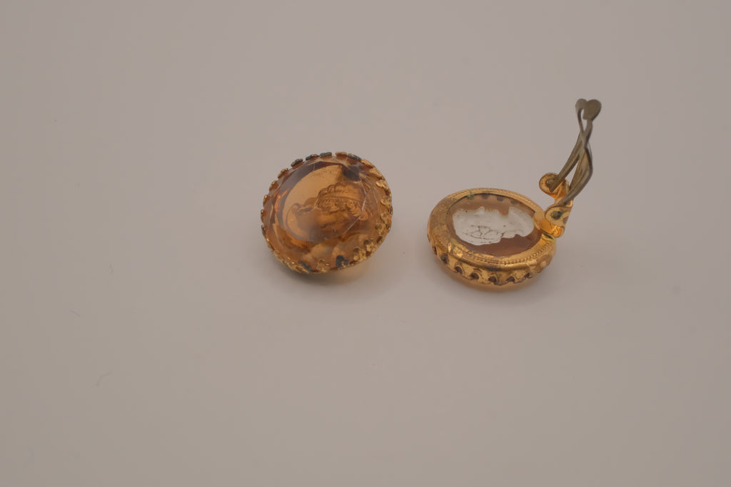 Vintage translucent amber-tone molded glass cameo clip-on earrings