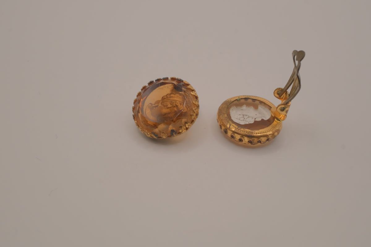 Vintage translucent amber-tone molded glass cameo clip-on earrings