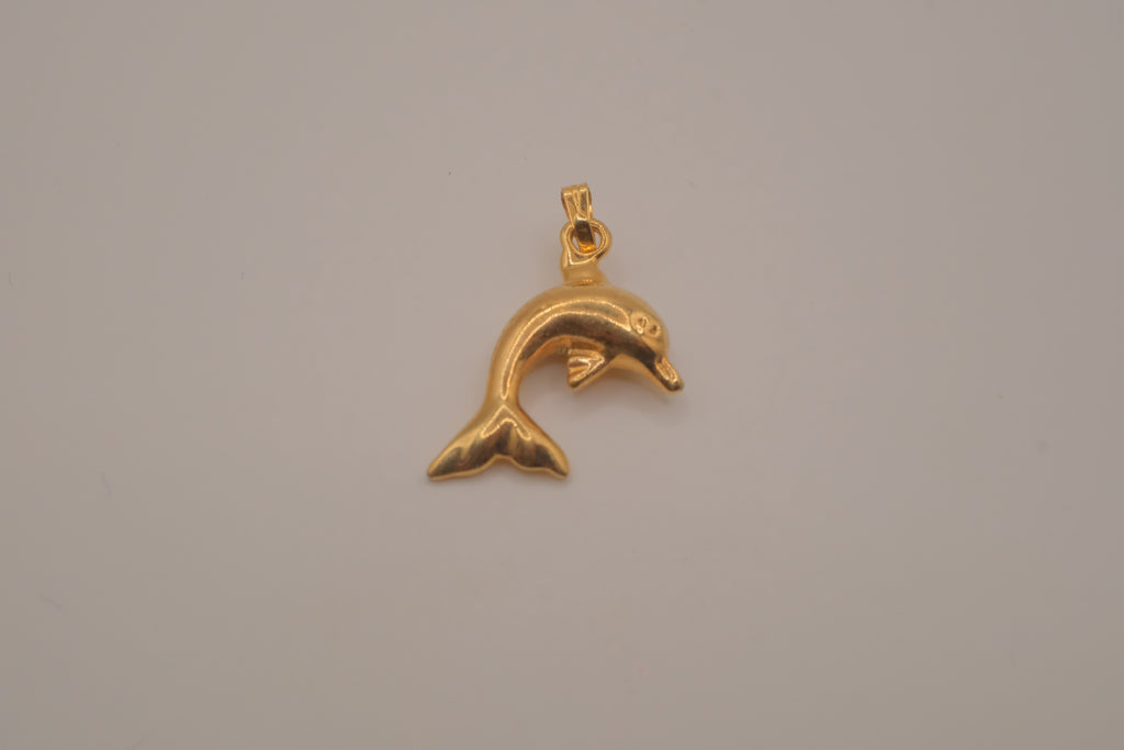 Classic gold toned dolphin pendant