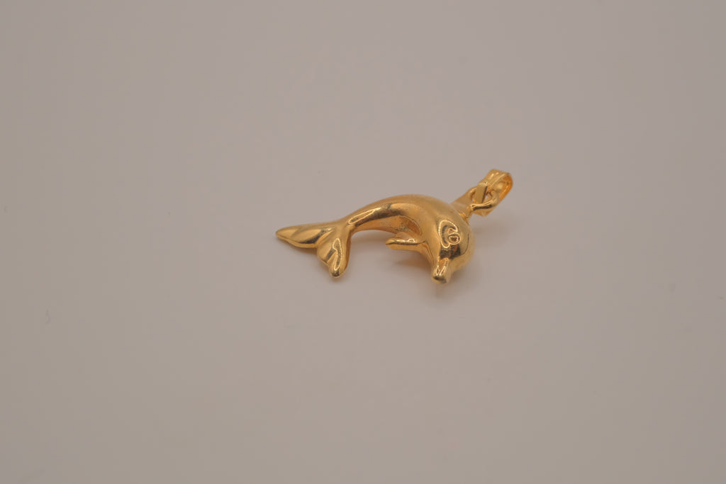 Classic gold toned dolphin pendant
