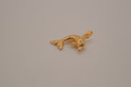Classic gold toned dolphin pendant