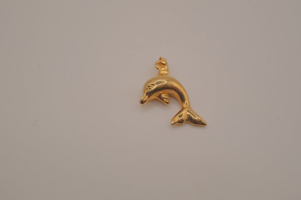 Classic gold toned dolphin pendant