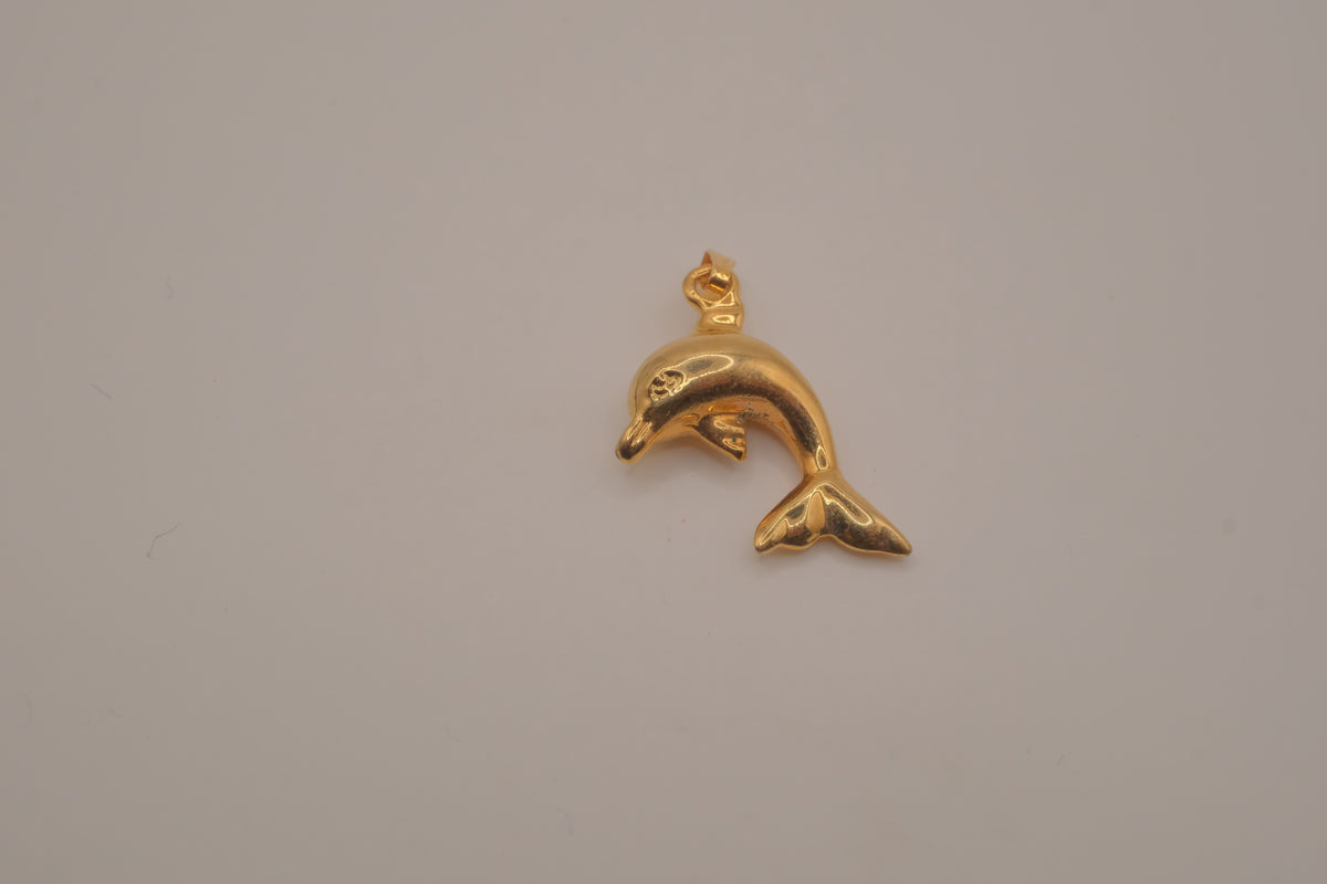 Classic gold toned dolphin pendant