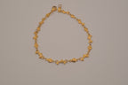 Gold tone Dolphin &amp; Hearts link bracelet