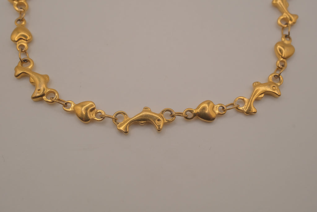 Gold tone Dolphin &amp; Hearts link bracelet