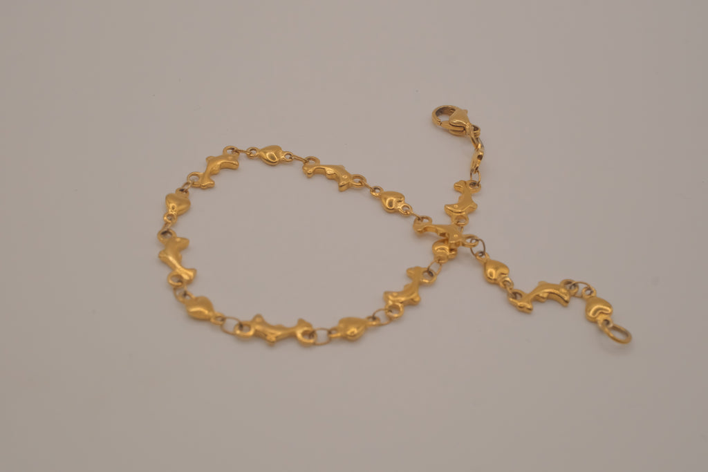 Gold tone Dolphin &amp; Hearts link bracelet
