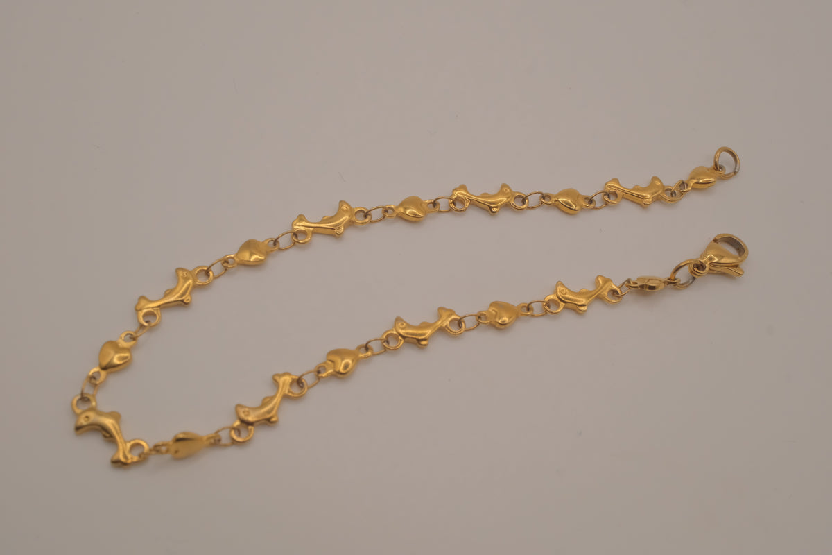 Gold tone Dolphin &amp; Hearts link bracelet