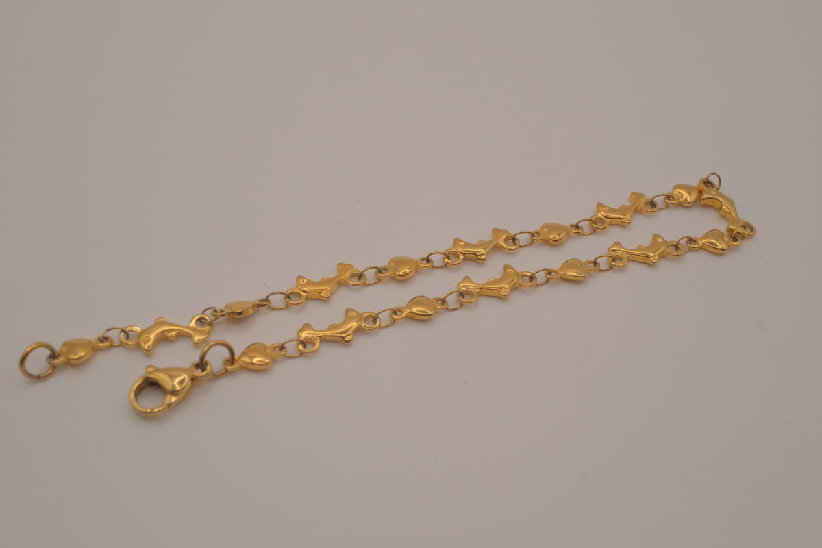 Gold tone Dolphin &amp; Hearts link bracelet