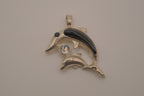 Vintage mother and baby double dolphin pendant