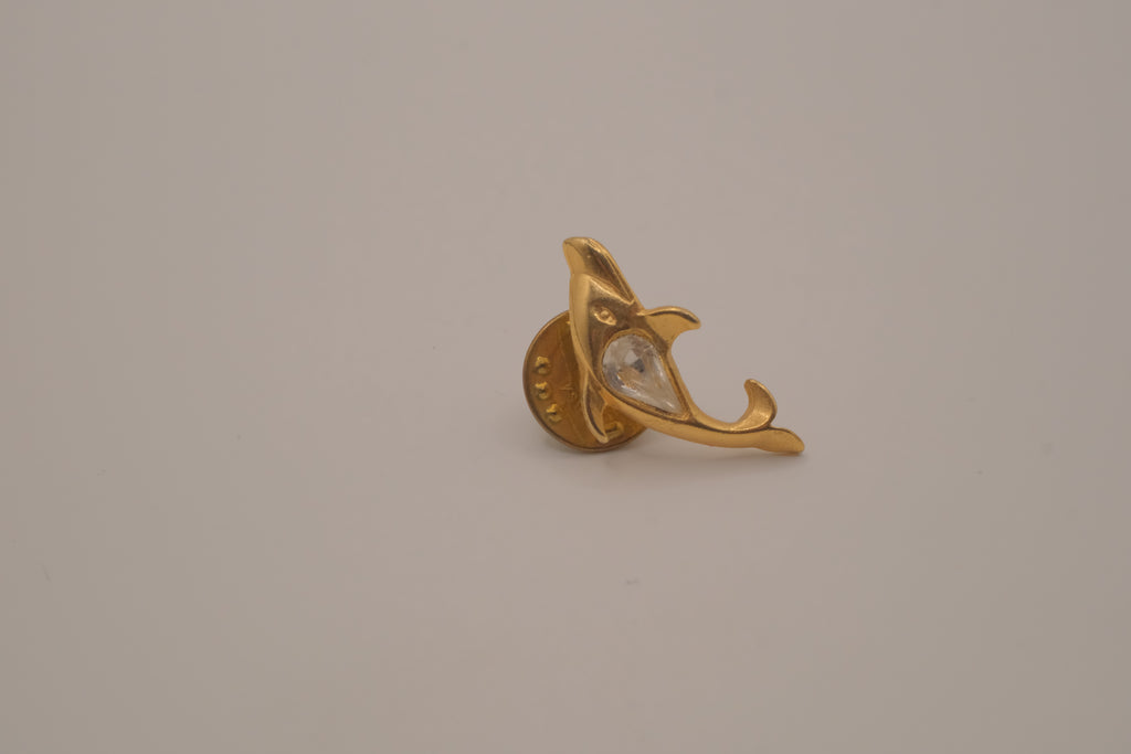 Vintage gold-toned dolphin rhinestone lapel pin