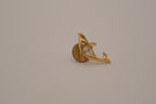 Vintage gold-toned dolphin rhinestone lapel pin