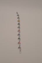 Silver-tone abalone dolphin as crescent motifs link bracelet