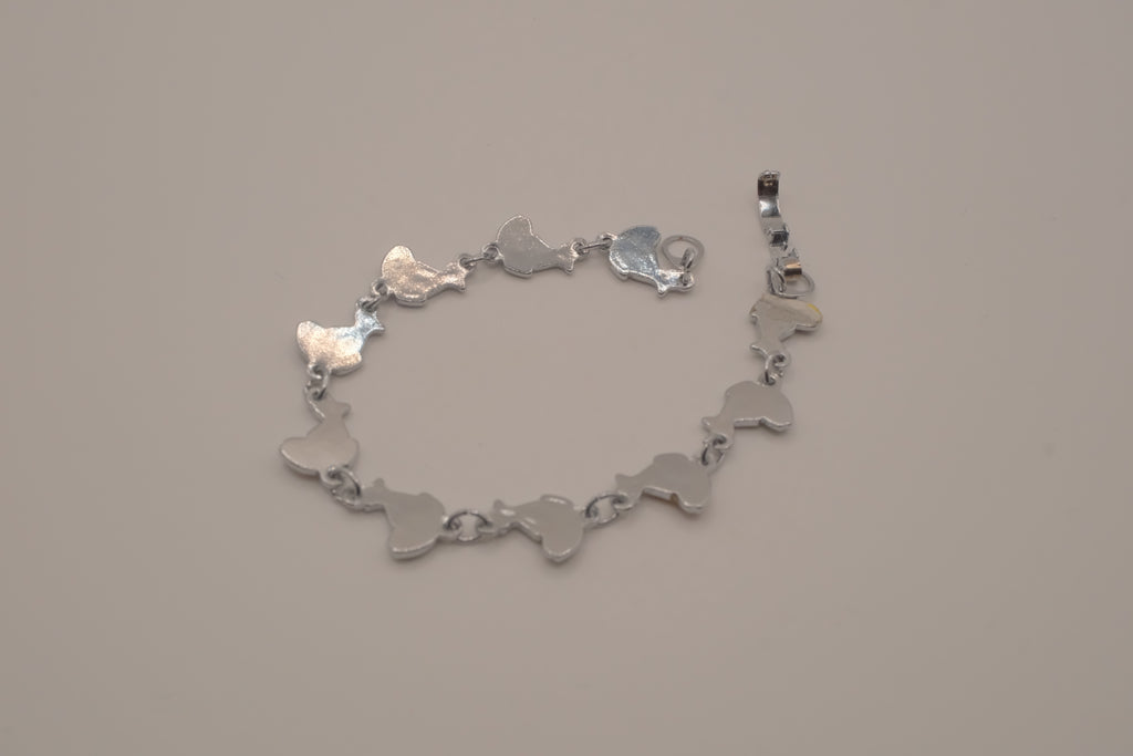 Silver-tone abalone dolphin as crescent motifs link bracelet