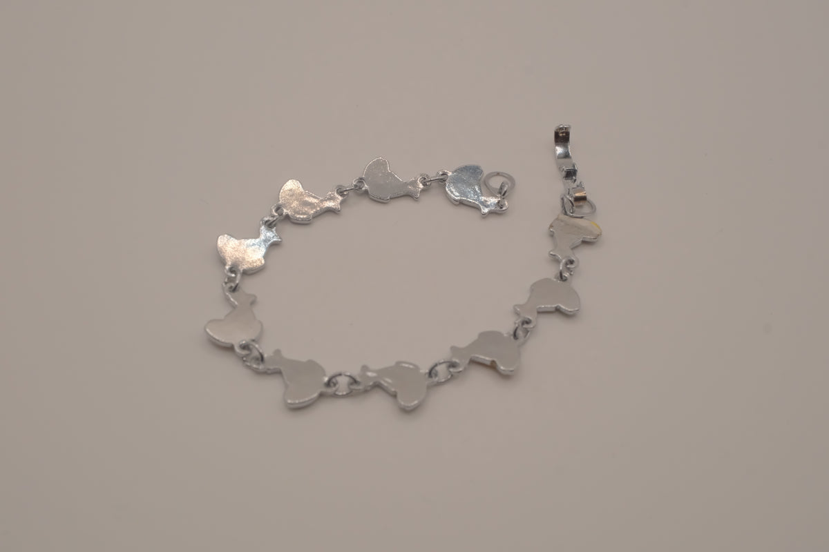 Silver-tone abalone dolphin as crescent motifs link bracelet