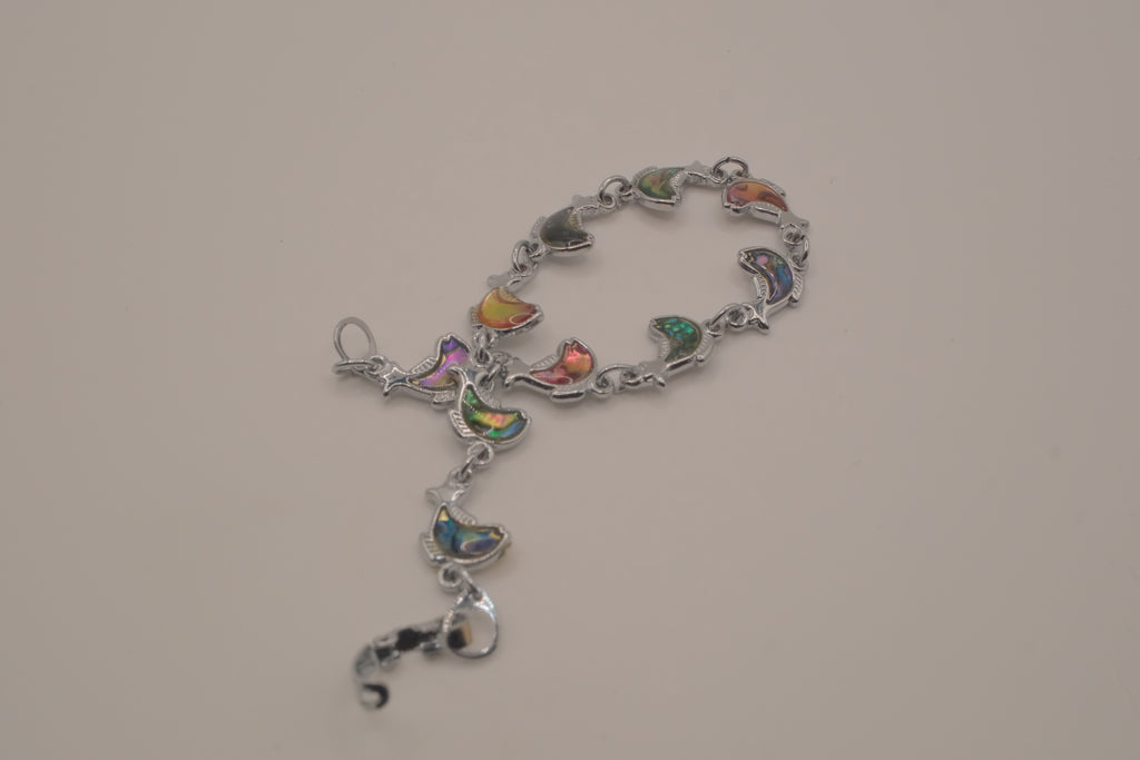 Silver-tone abalone dolphin as crescent motifs link bracelet