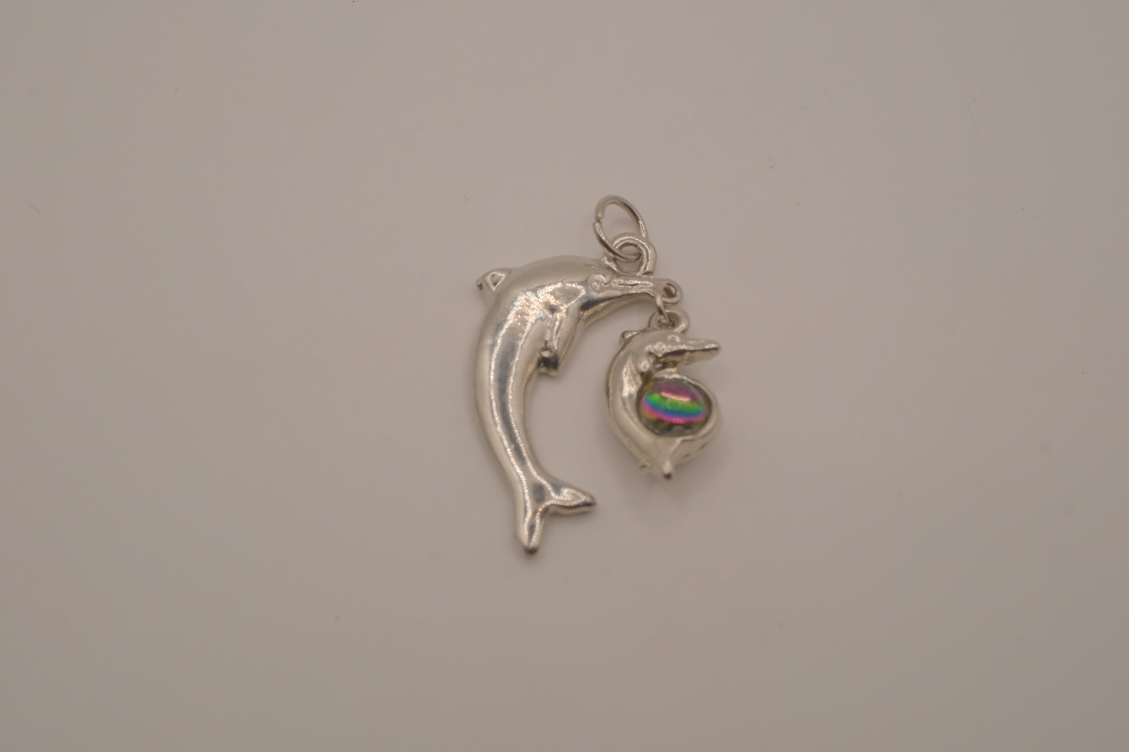 Silver tone Double dolphin pendant