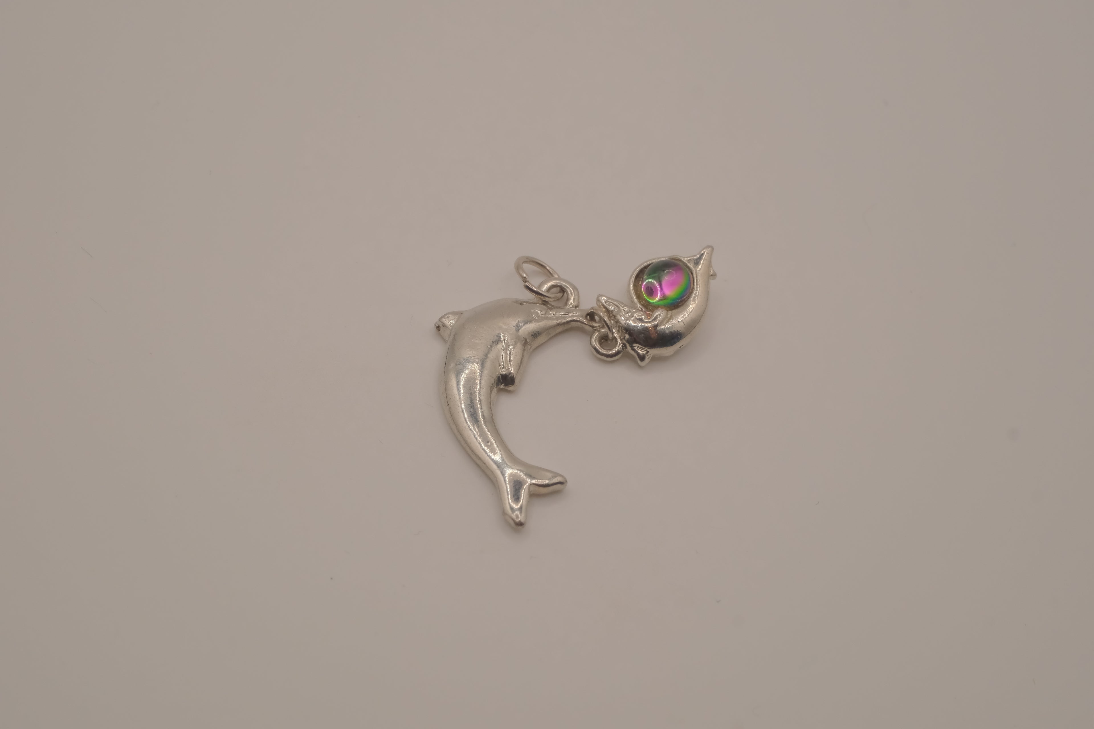 Silver tone Double dolphin pendant