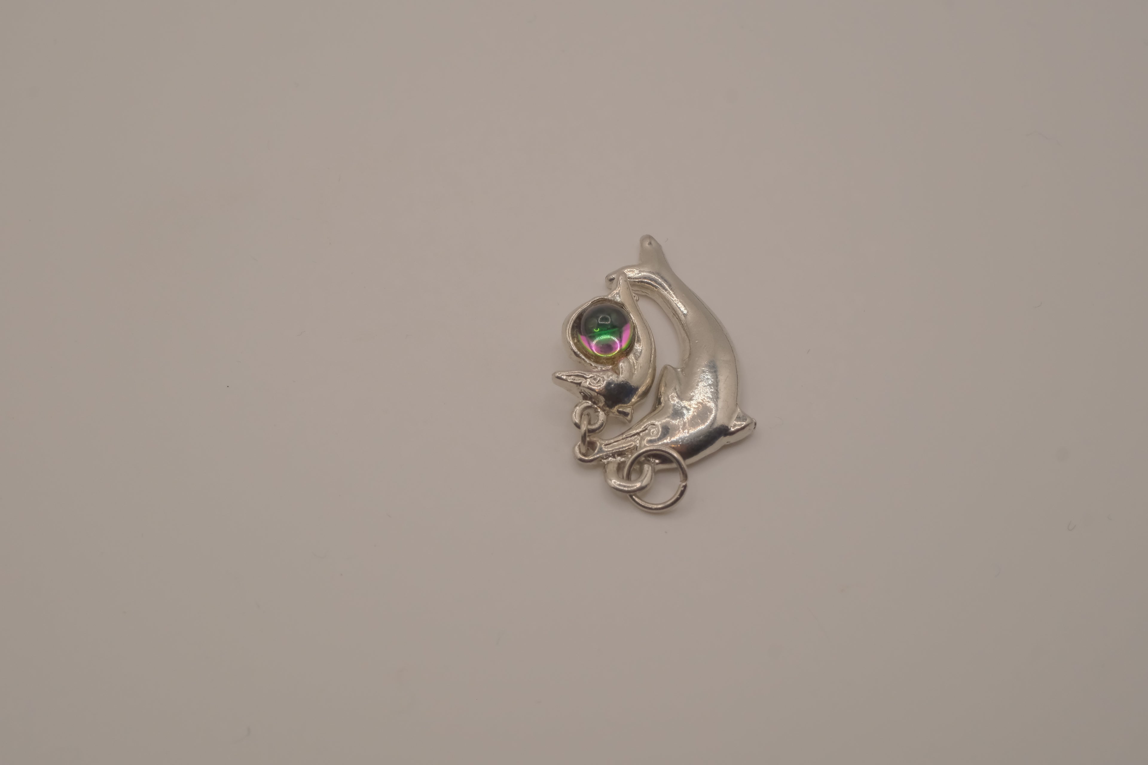 Silver tone Double dolphin pendant