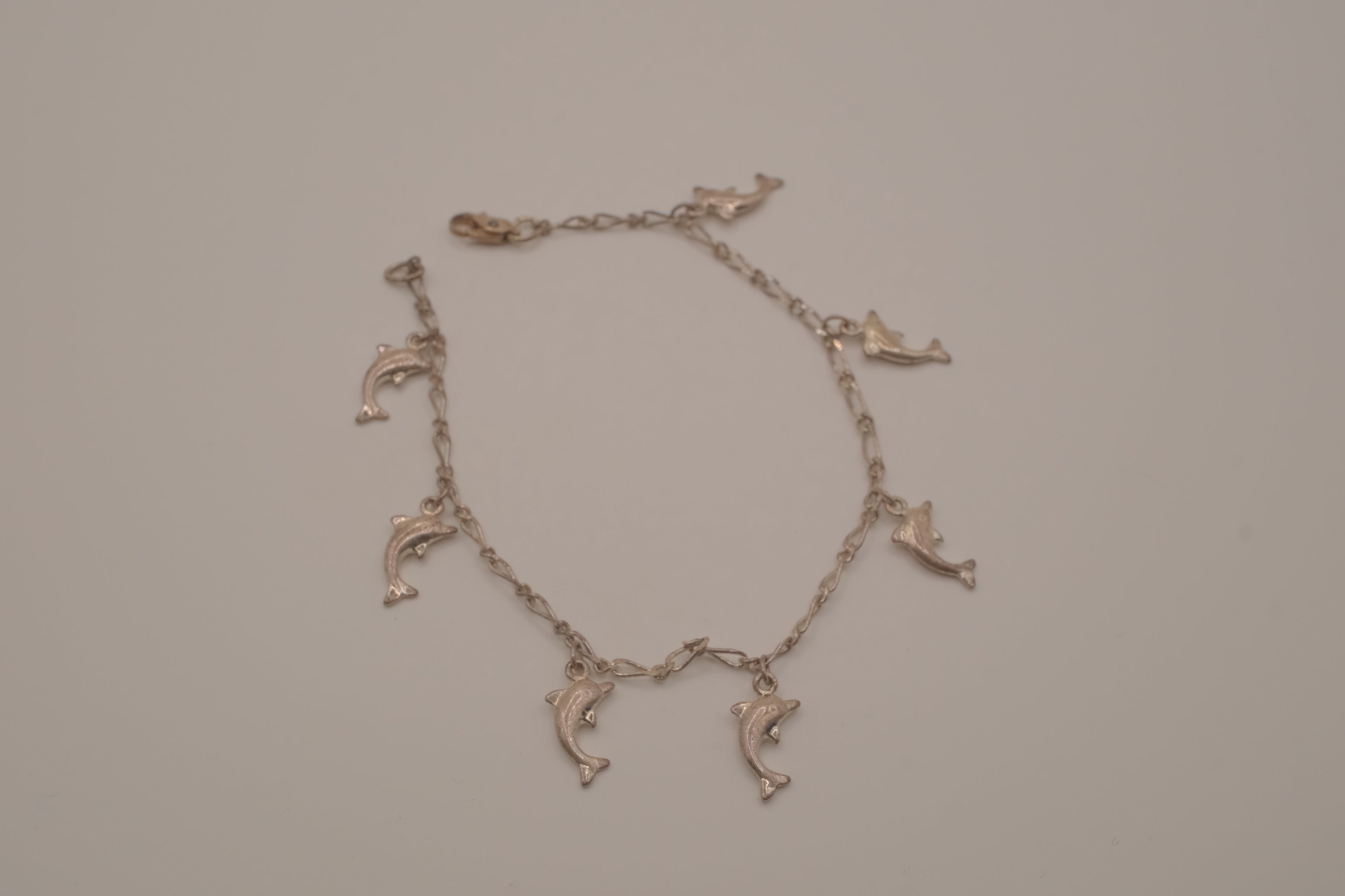 Vintage silver tone dolphin charm bracelet