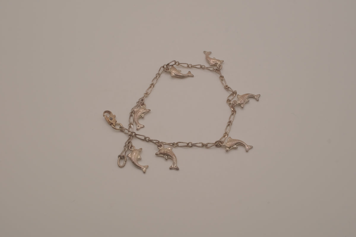 Vintage silver tone dolphin charm bracelet