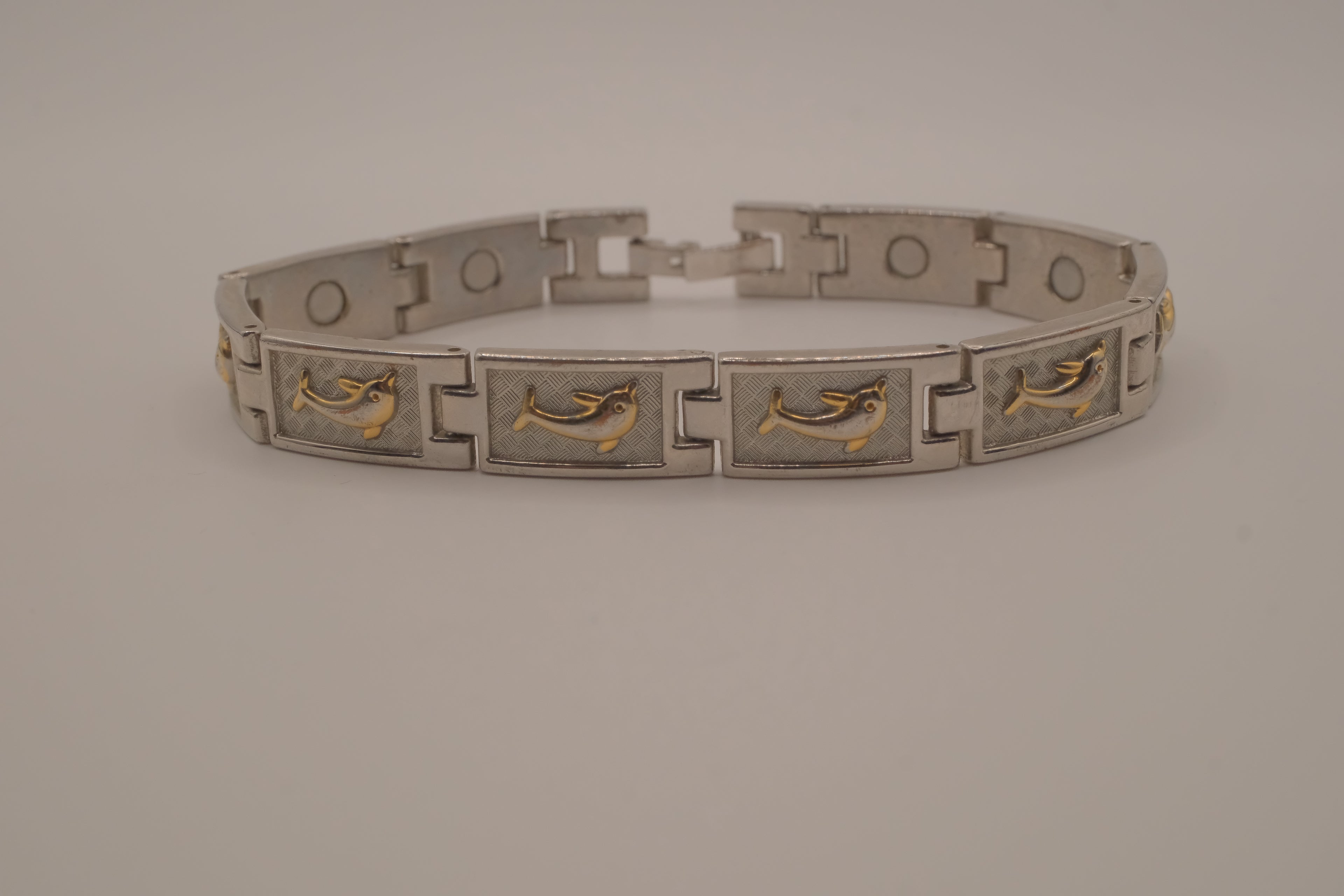Two-tone dolphin design link bracelet
