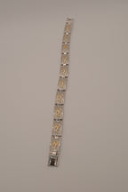 Two-tone dolphin design link bracelet