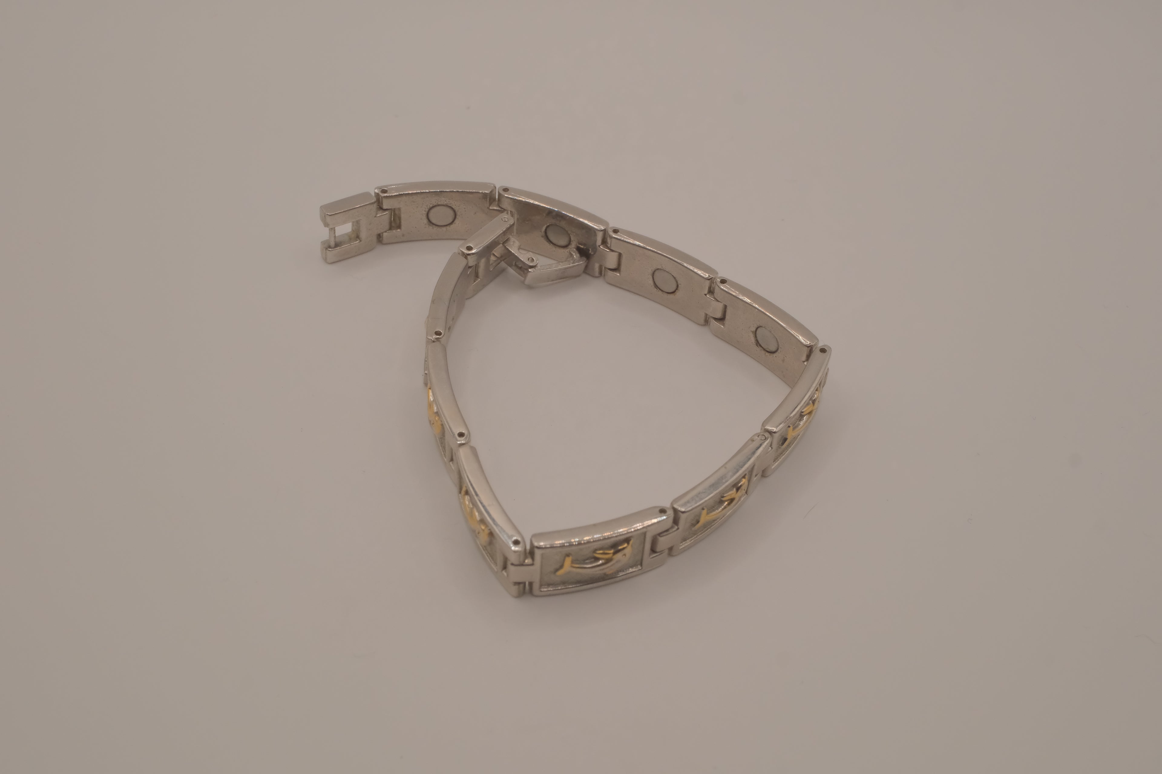 Two-tone dolphin design link bracelet