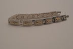 Two-tone dolphin design link bracelet