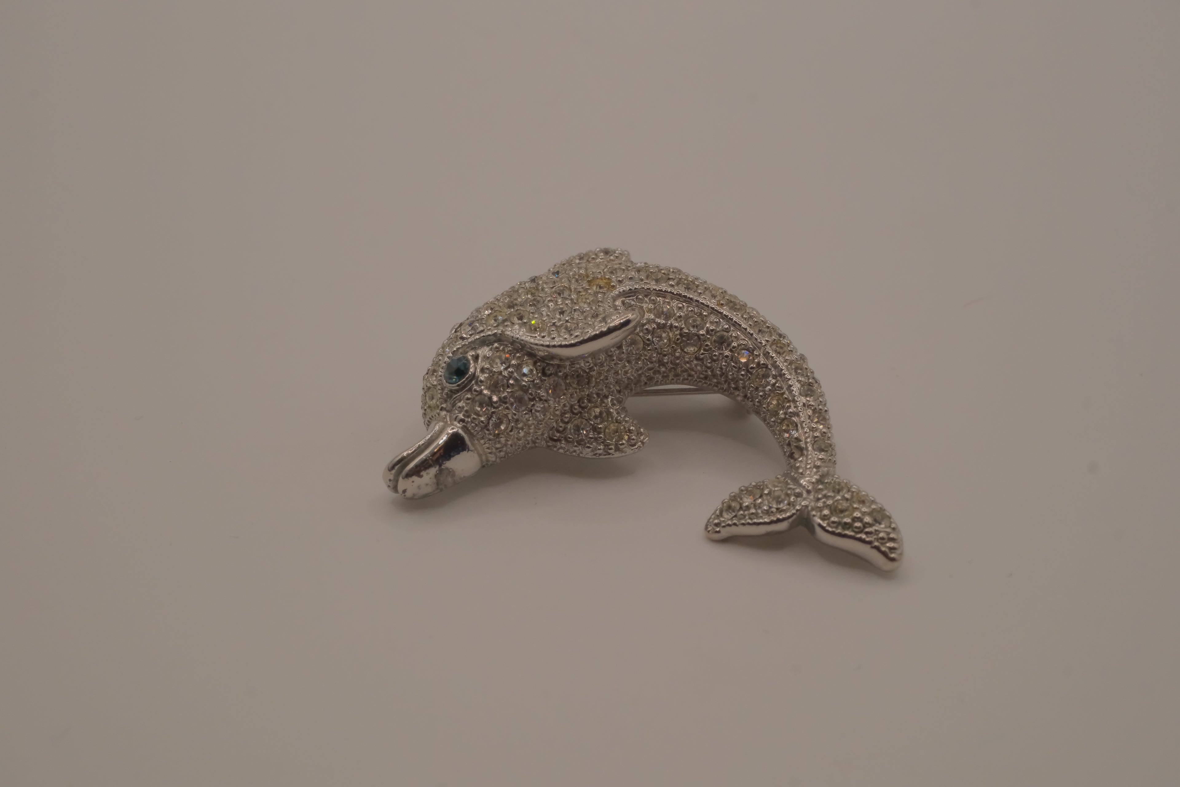 Vintage crystal dolphin brooch