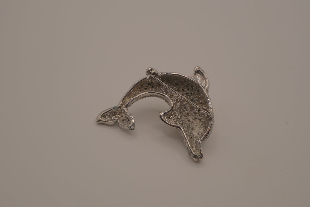 Vintage crystal dolphin brooch