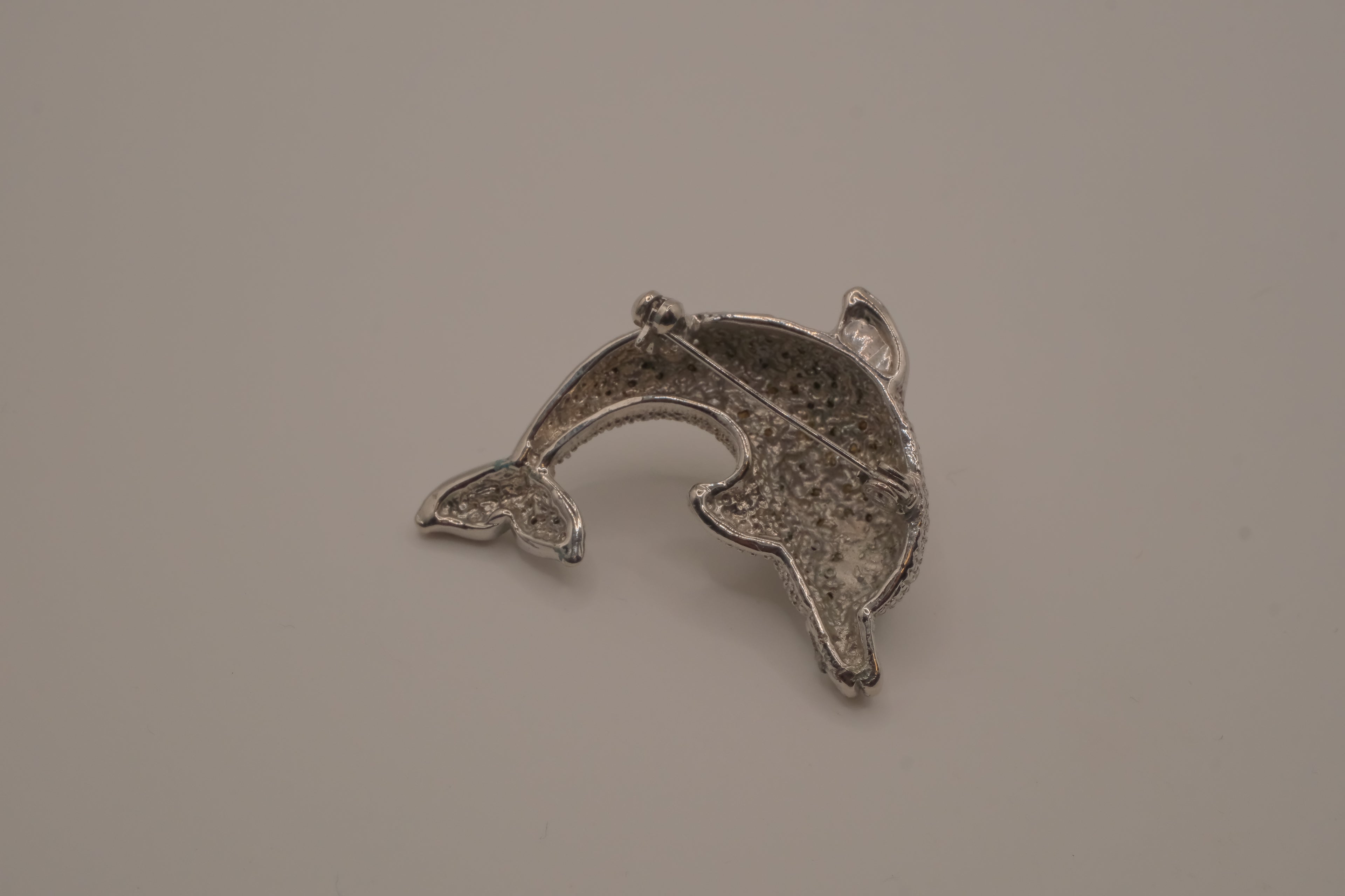 Vintage crystal dolphin brooch
