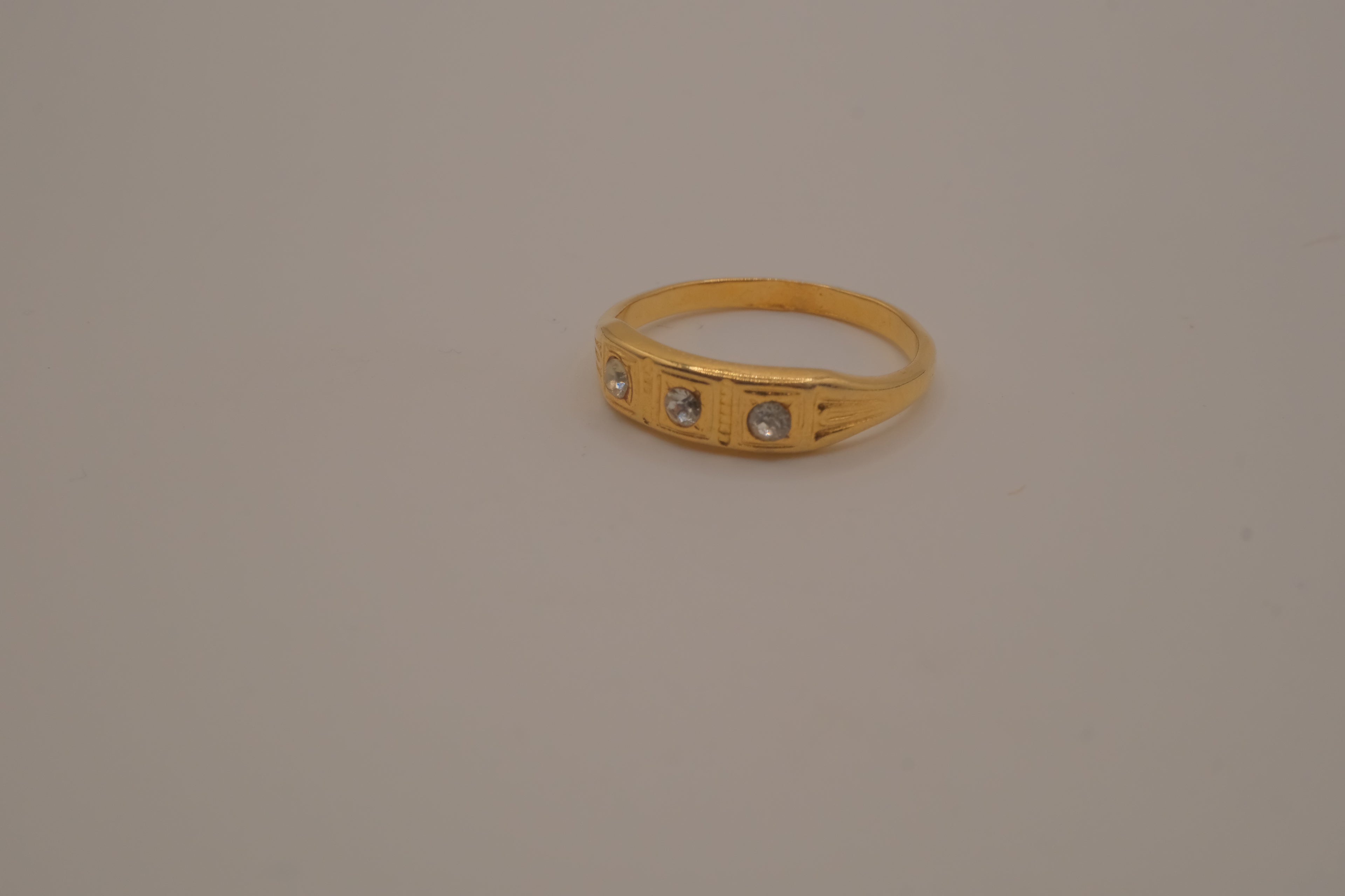 Victorian-style gold tone trilogy ring