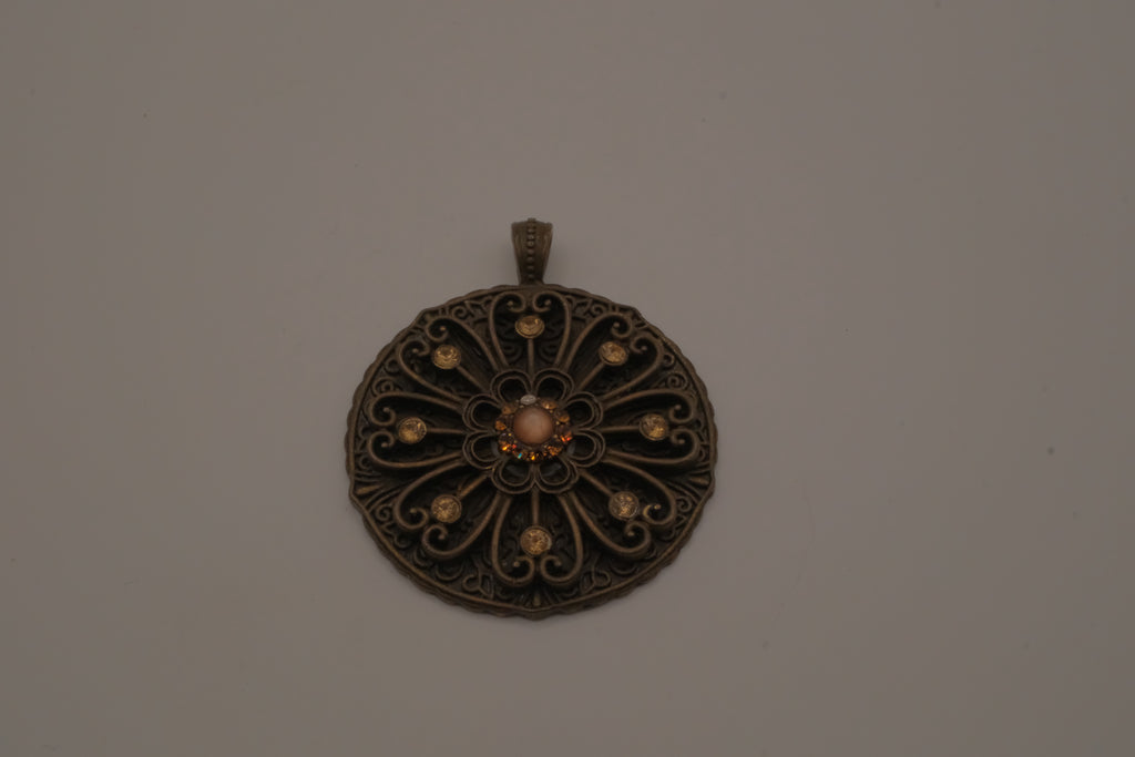 Vintage bronze-tone openwork filigree medallion pendant