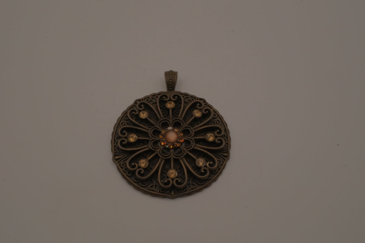 Vintage bronze-tone openwork filigree medallion pendant