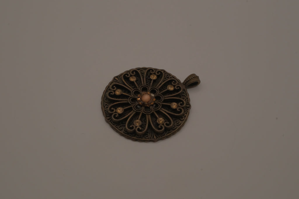 Vintage bronze-tone openwork filigree medallion pendant
