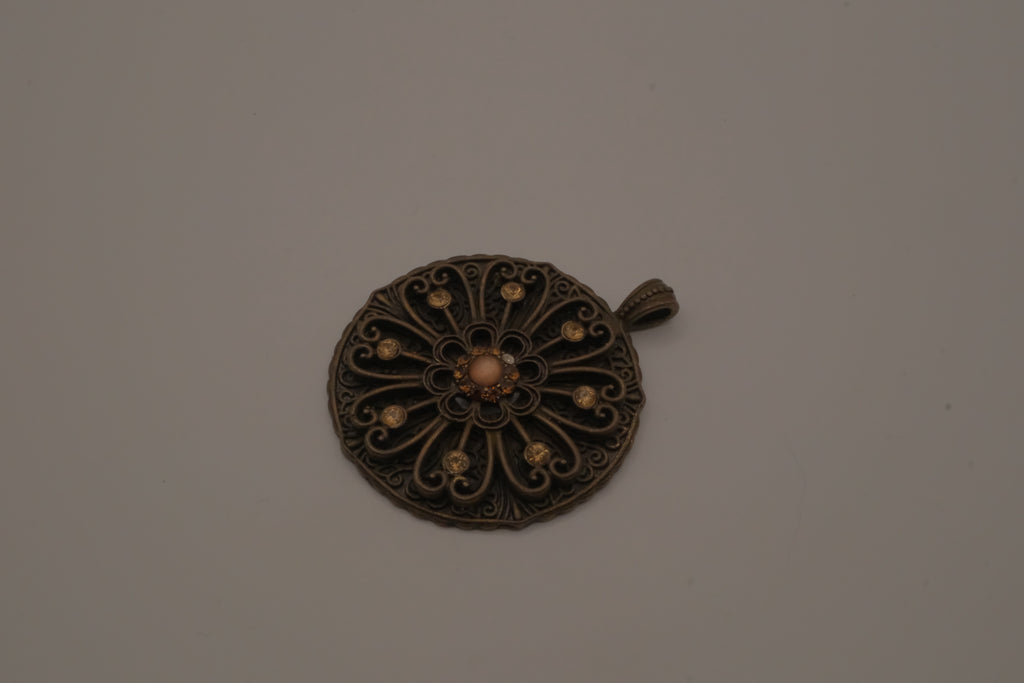 Vintage bronze-tone openwork filigree medallion pendant