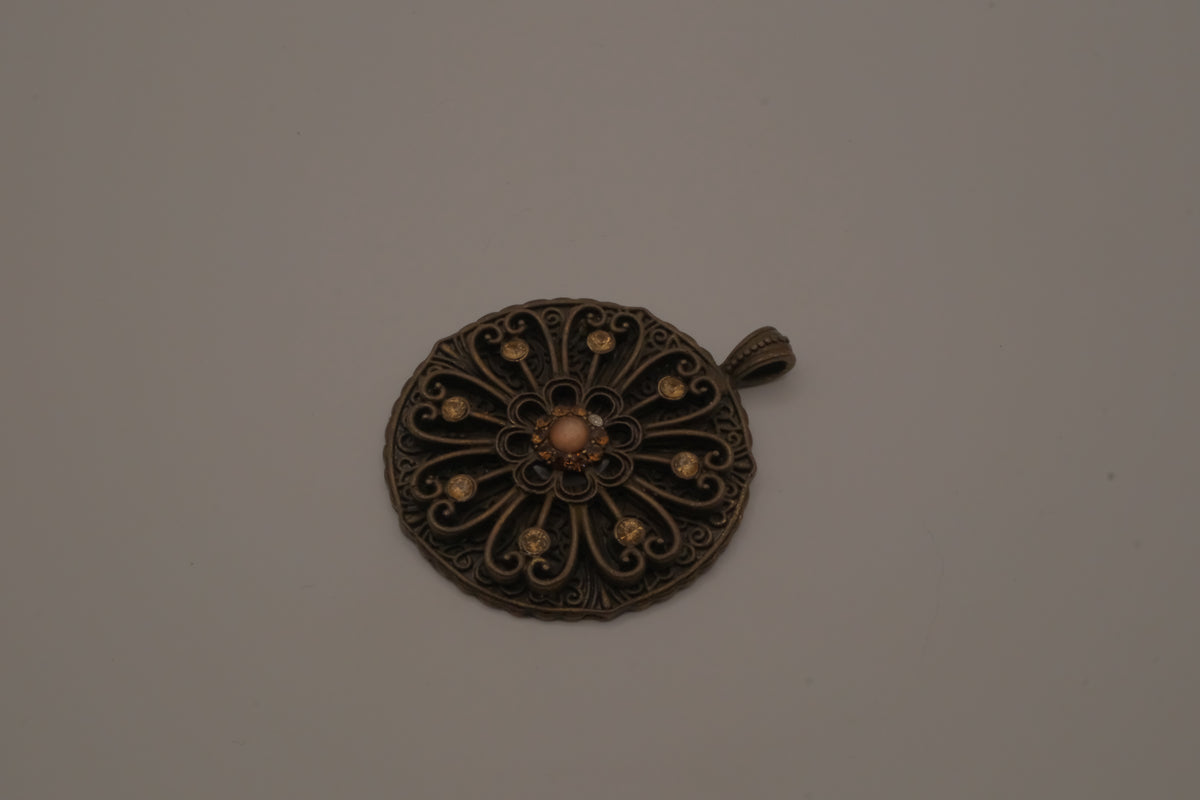 Vintage bronze-tone openwork filigree medallion pendant
