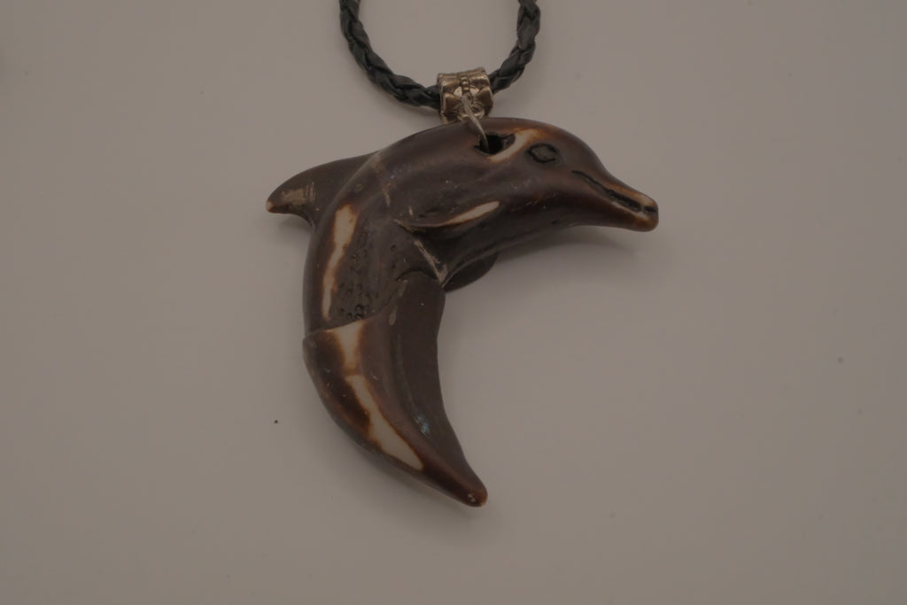 Hand-carved wooden dolphin pendant necklace