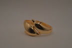 Gold tone two interlocking dolphins cuff bracelet